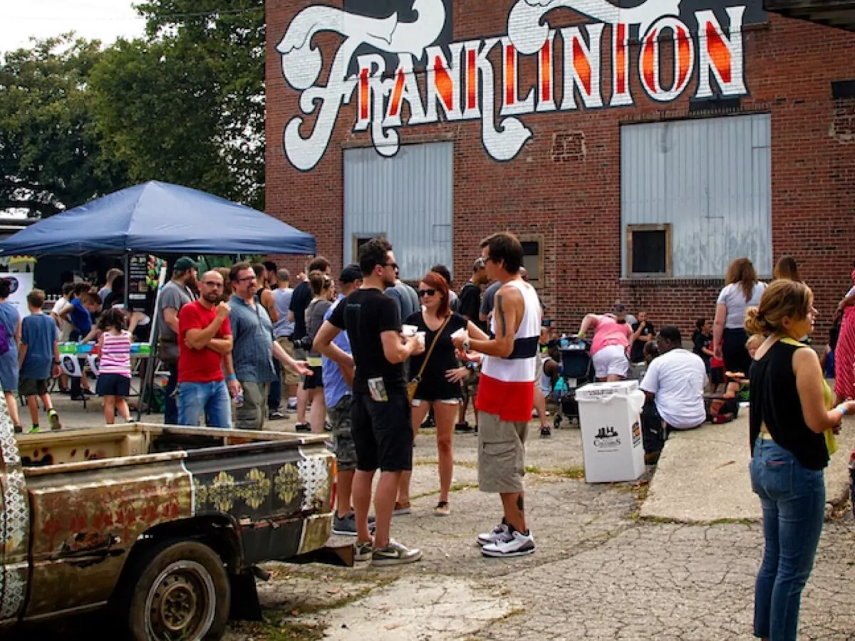 Image of a gathering in the Franklinton Arts District. Joint efforts with Gravity to expand arts acceptance, appreciation, and support in the community.